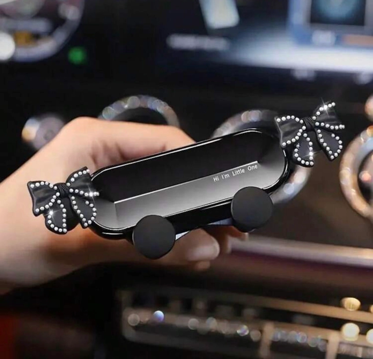 diamond bow-shaped air vent car phone holder. 📱